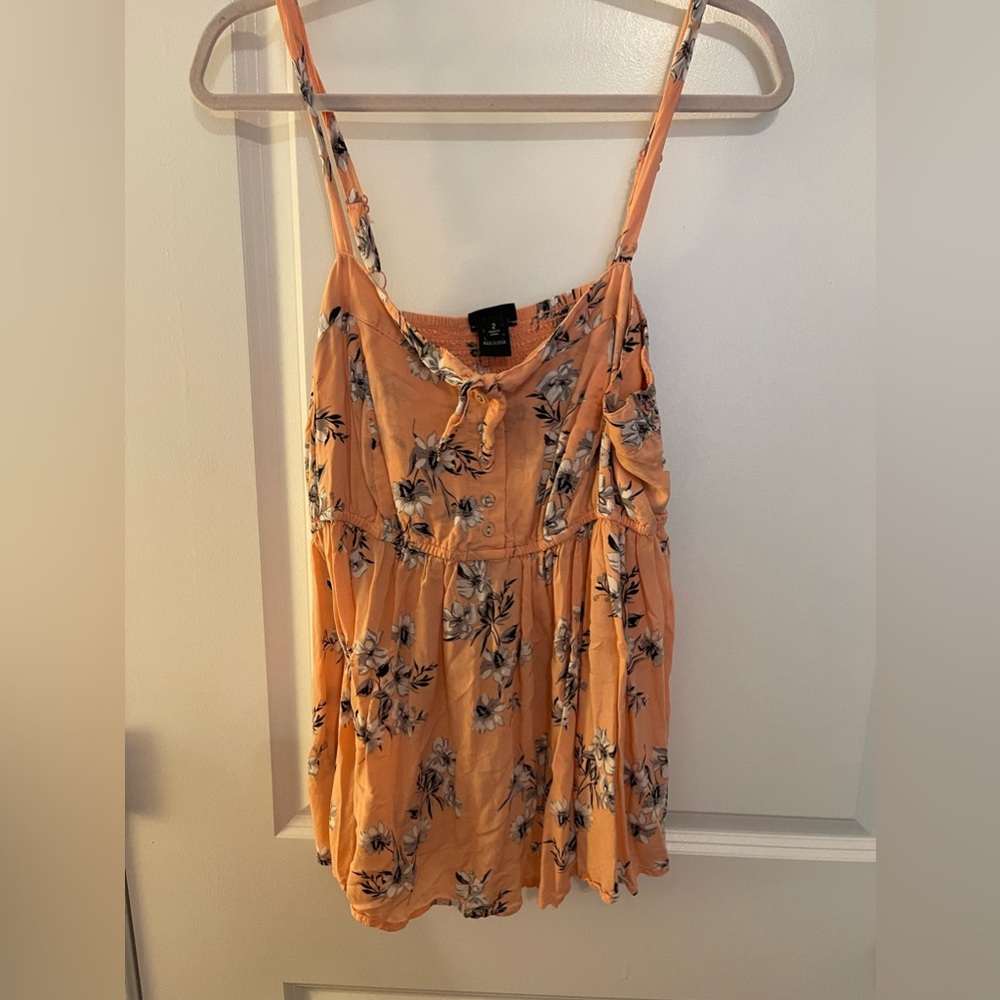 Torrid tank top, peach with black white and gray flowers. Size 2 (18/20)